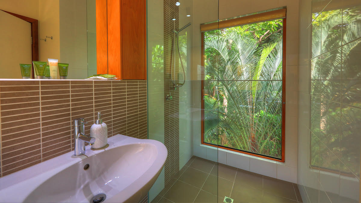 Montville accommodation shower with tropical garden view